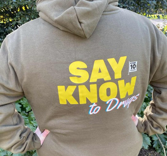 10 Year Anniversary Supporter’s Hoodie (Khaki)